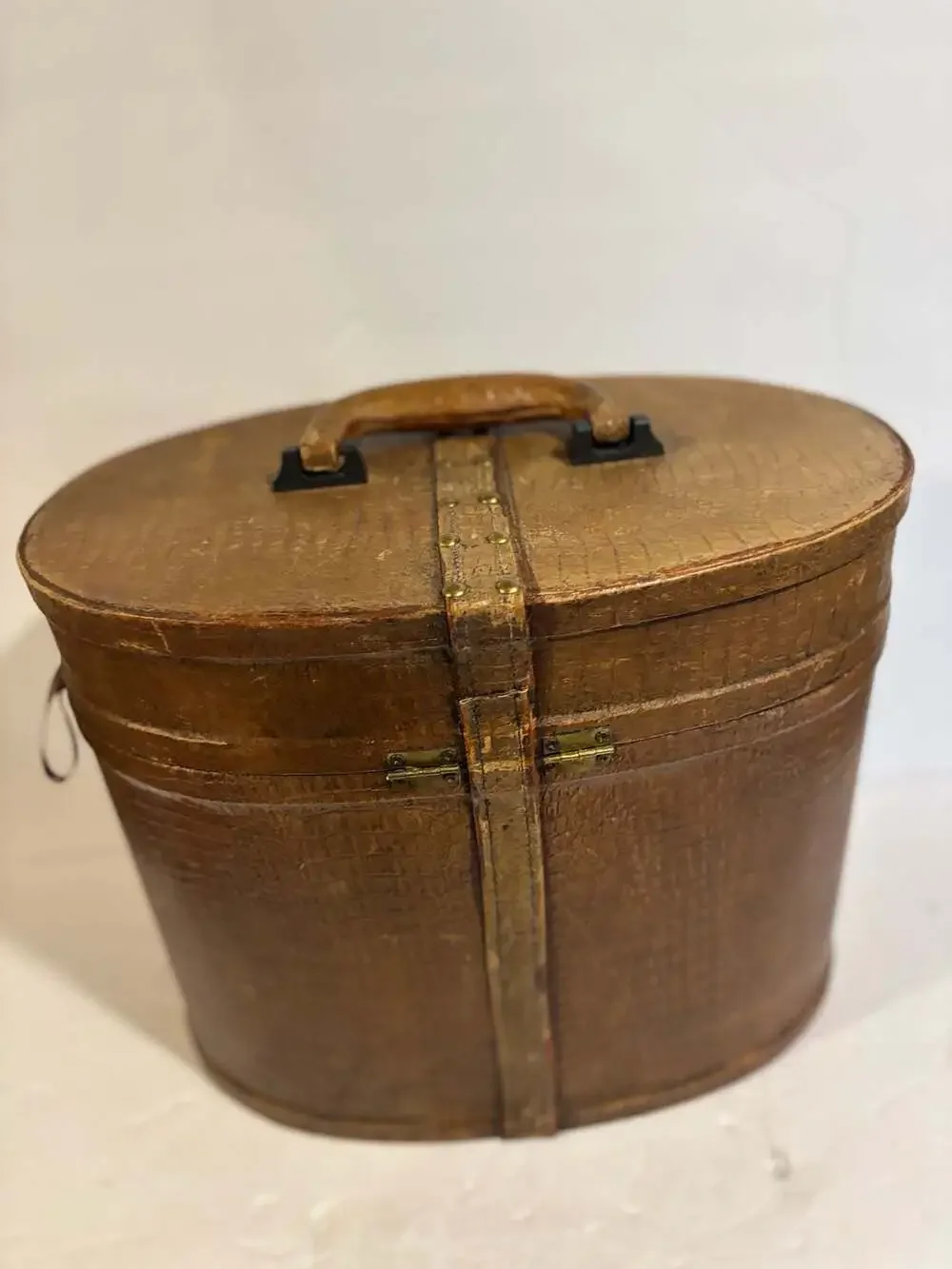 Vintage Oval Leather Hat Box with Brass Buckle and Burgundy Lining